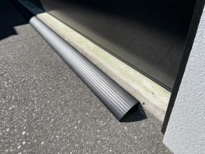 Close up of x2 3m POWDER COATED length sections of KERBY an Aluminum driveway ramp as a pro option in a modern subdivision situated in Rolleston Selwyn. Installed by XDC.nz